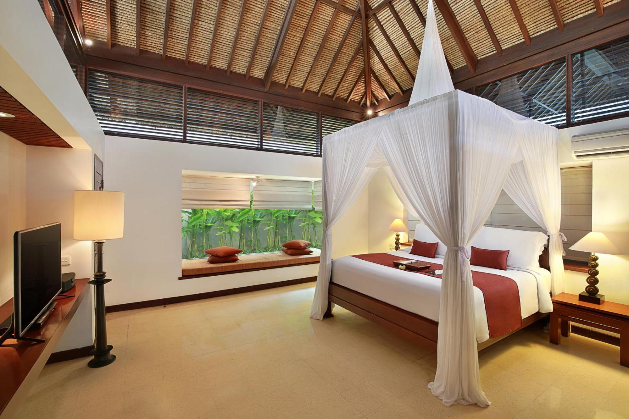 バリ ニクソマ ブティック ビーチ リゾート レギャン エクステリア 写真 A bedroom at the resort